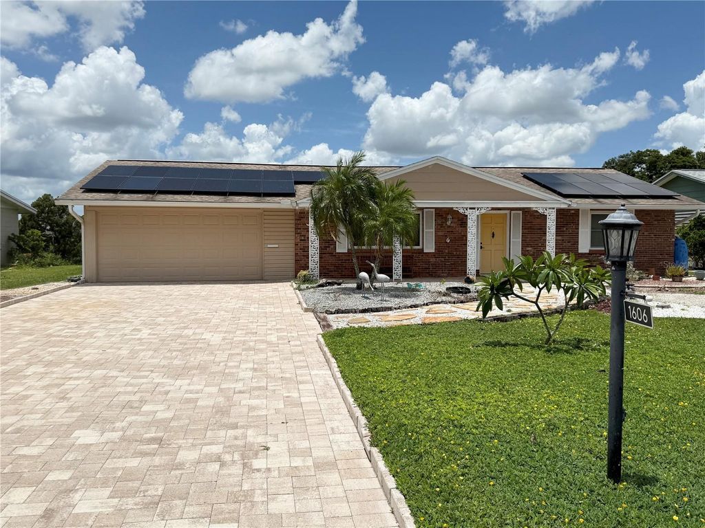 Photo of 1606 N Pebble Beach Boulevard, Sun City Center, FL 33573 (MLS # O6328493)