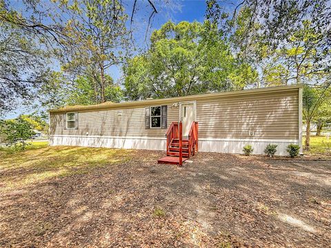 Photo of 11946 SE 99th Terrace, Belleview, FL 34420 (MLS # TB8495396)