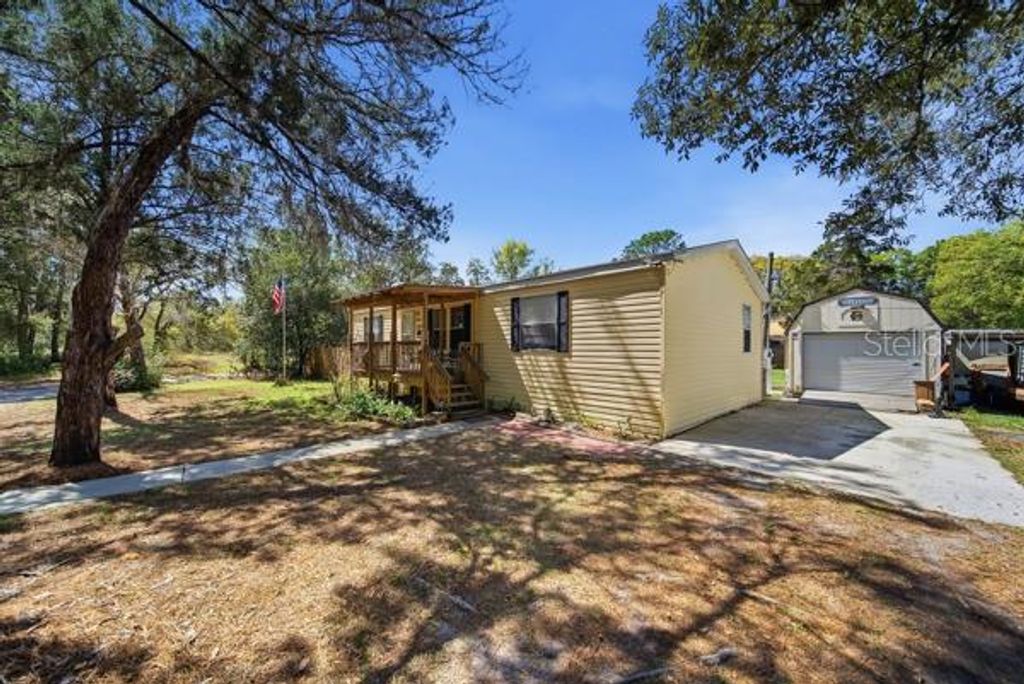 Photo of 12148 Rutherford Lane, Hudson, FL 34669 (MLS # W7882811)