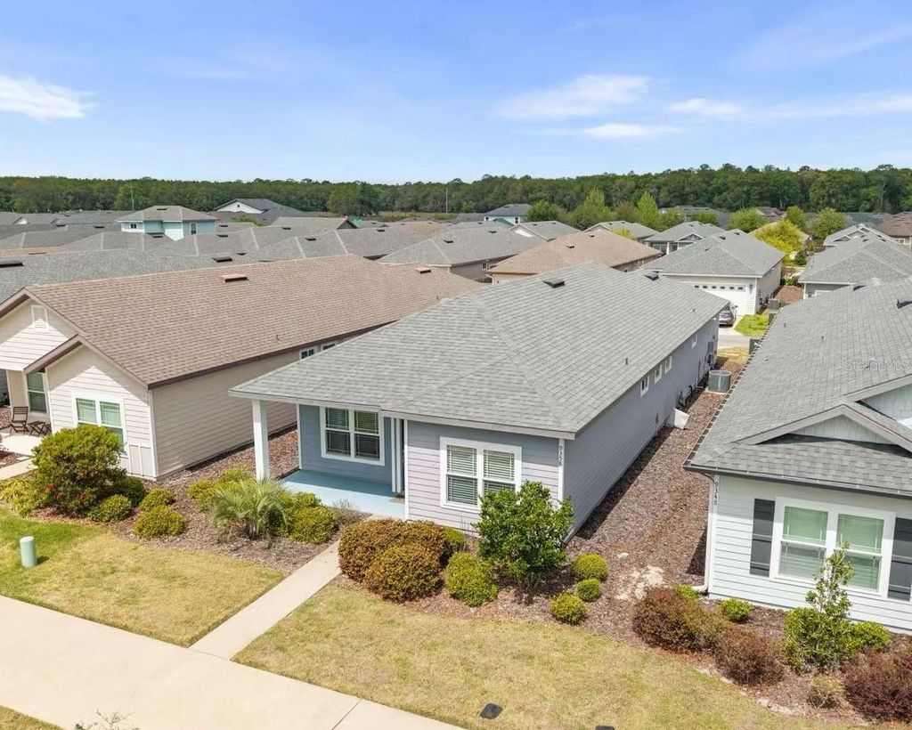 Photo of 9358 SW 68th Lane, Gainesville, FL 32608 (MLS # GC539358)