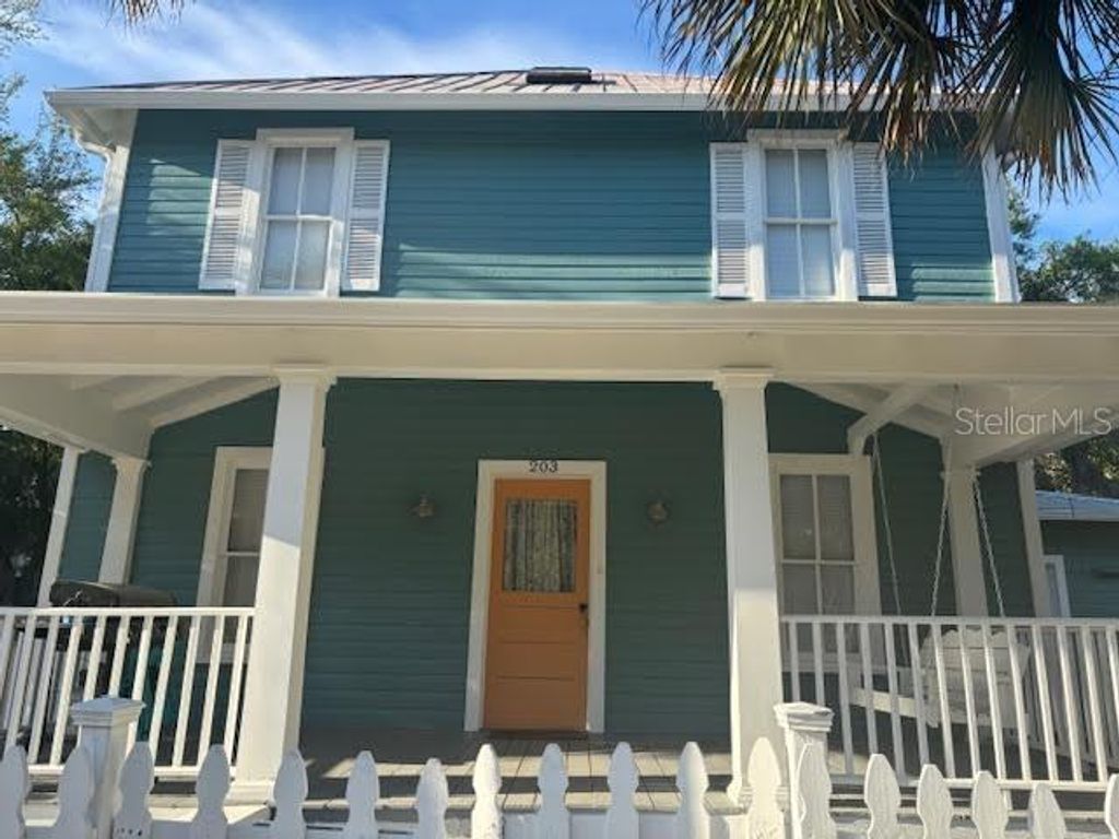 Photo of 201 E Voorhis Avenue, Deland, FL 32724 (MLS # O6422387)