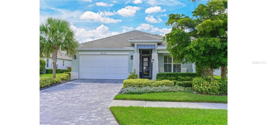 Photo of 7983 Sandstar Way, Sarasota, FL 34240 (MLS # A4656049)
