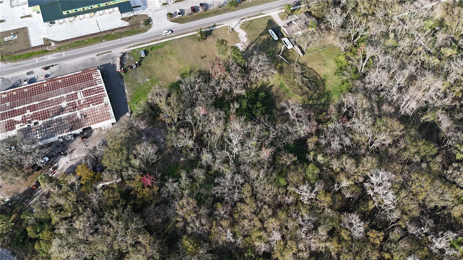 Prime Commercial Lot – Two-Lot Assemblage
This cleared, development-ready commercial property consists of two adjoining lots in a prime Plant City location. With excellent road
frontage on E Alsobrook St, the site is ideal for retail, office, mixed-use, or light industrial development. Zoned commercial, it offers
ample space and flexibility for various business opportunities.
Located in Plant City's Southside Commercial District, the site provides easy access to SR 574, I-4, and downtown Plant City.
Surrounded by businesses, retail centers, and industrial facilities, this high-visibility location is perfect for a variety of commercial
ventures.
