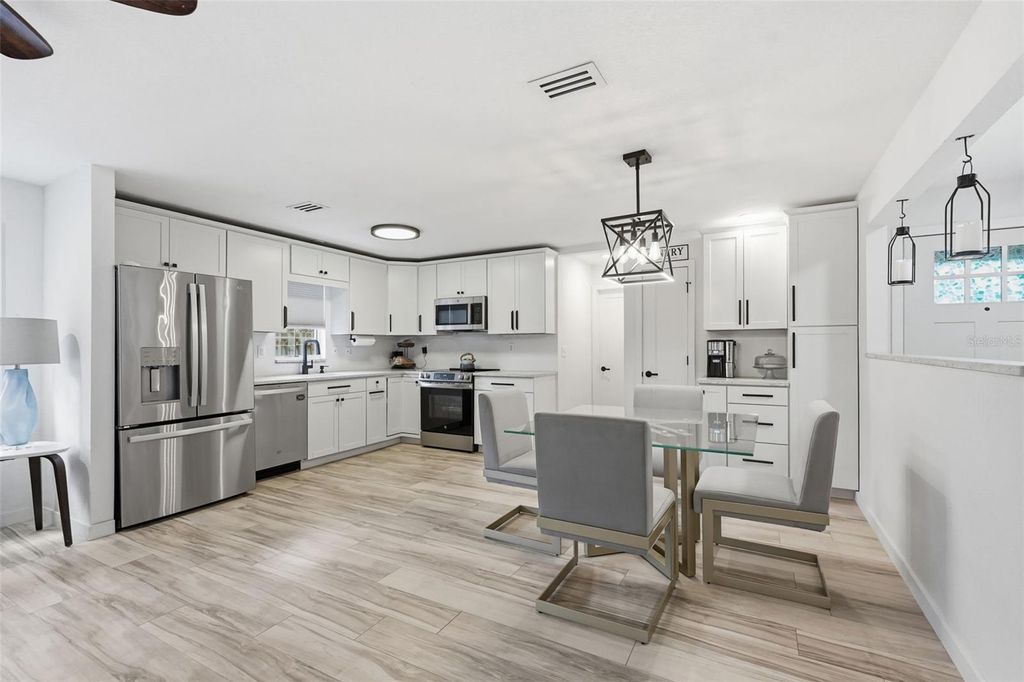 Photo of 811 Michigan Boulevard, Dunedin, FL 34698 (MLS # TB8495445)