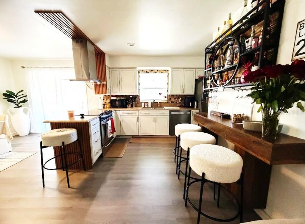 Photo of 137 N Nowell Street, Orlando, FL 32835 (MLS # O6386184)