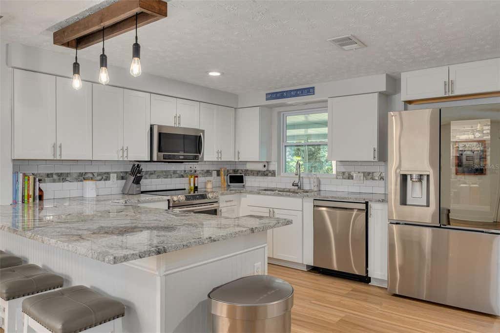 Photo of 5030 Overlook Drive, New Port Richey, FL 34652 (MLS # TB8541275)