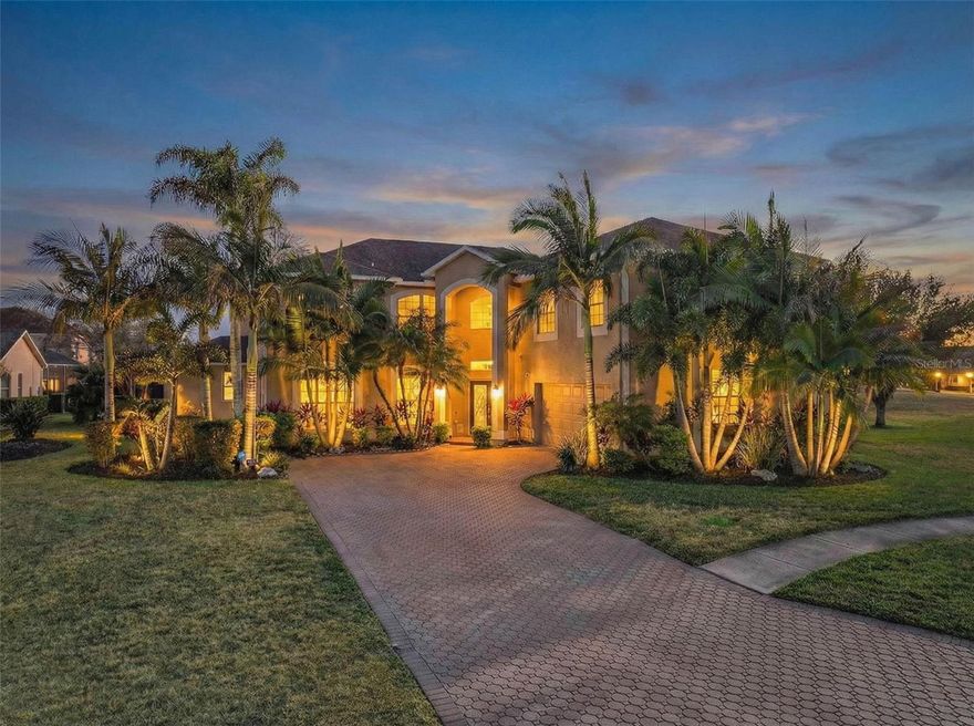 Stately golf course estate in the exclusive St. Andrews enclave of The Eagles in Odessa, perfectly positioned on a quiet cul-de-sac overlooking the 13th green. This expansive 5-bedroom, 3-bath residence offers over 4,000 square feet of thoughtfully designed living space with elegant architectural details and seamless indoor-outdoor living. Majestic stained glass front doors open to a dramatic staircase and grand foyer that sets the tone for the home’s refined style. The chef’s kitchen is a true showpiece featuring premium Miele appliances, a large central island, dedicated barista bar, double pantry closets with handsome wood doors, and abundant cabinetry enhanced with pull-out shelving and built-in spice racks. The breakfast area and kitchen enjoy sweeping views across the pool deck to the golf course, creating a stunning backdrop for everyday living. The impressive primary suite features vaulted ceilings and generous proportions, while the upper level offers four additional bedrooms, including an oversized bedroom with its own private office space. A large bonus room, currently configured as a theater, provides exceptional flexibility for entertaining or recreation. Step outside to a resort-style outdoor living area designed for year-round enjoyment, complete with an outdoor kitchen, outdoor fireplace, and outdoor shower — all overlooking the manicured fairway. Additional highlights include a hard-wired surveillance system with four cameras, 2012 roof, and no carpet throughout for easy maintenance and modern appeal. Located within the gated Eagles community, residents enjoy 24-hour security, championship golf, and a prime Odessa location close to top-rated schools, dining, and major thoroughfares. A rare opportunity to own a luxury golf course home with space, privacy, and unforgettable views. Call today to schedule your private showing.