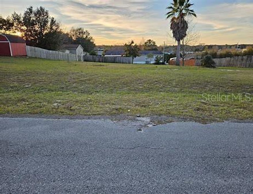 Ready-to-build lot for your mobile home! No impact fees, with a driveway apron already installed, boundary survey done, and water connection available on this spacious 0.33-acre property. Save big on this prime location in Belleview Hills Estate near Hwy 301, just minutes away from Ocala, Belleview, The Villages, and The City of Wildwood. Perfect opportunity to settle into your new home!
