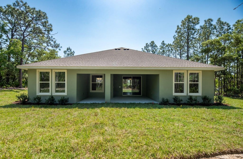 Photo of 1834 NW 79th Loop, Ocala, FL 34475 (MLS # OM727434)