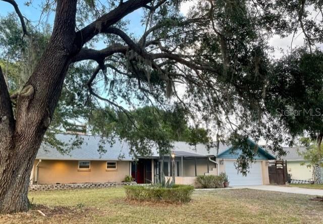 Welcome to Bent Tree Village! This very popular, sought after Community with mature trees and lush, green foliage is a short distance East. of I-75 off Bee Ridge Road. The entrance to this peaceful Subdivision is South of Bee Ridge onto Bent Tree Blvd. and has a Low Annual Fee of $300 and NO CDD'S! Wow! This 3 Bedroom and 3 Full Baths Split Plan Home with 2,180 sq. ft. is situated on a large, partially fenced, corner lot and has a sprinkler system with a 30' well for irrigation! (Saves $$ on water bill). Your Future Home is ready for you to update, as you wish! Just bring your imagination, a color palette and your bathing suit! The possibilities are endless! There are 17 Impact Windows throughout the Home! There are 4 sets of French Doors with installable, protective, hurricane covers, (stored in the garage) and 3 of the sets give direct access to the sparkling, 45'X13', caged pool for your Enjoyment on one of our many, hot Summer days! A New Shingle Roof and 3 skylights were installed in January, 2023 as well as the Electrical Panel! The kitchen was updated in 2022 with new Cabinets and solid surface countertops, including the 8+' Breakfast Bar between the Kitchen and Family room. The newly installed skylight in the Family Room Brightens up even cloudy, rainy days! Let's not forget the large Living Room with Vaulted Ceiling, 2 skylights and a Fabulous Stone Fireplace with Marble Hearth over looking the awesome and inviting pool! Not too far from there we find the 12'X15' Dining Room with French Doors overlooking a low-walled and cleared out screened area perfect to be finished off and used as a patio or keep it open as a home for your favorite flowers and plants! The Large (13X17) Primary Bedroom with a (6X10) walk in closet and en suite Bathroom exits to pool also! This House has an abundance of Storage! Each of the 3 Baths have a Linen Closet and there's a Pantry in the Kitchen and Laundry Room! The Garage has 3 Work Benches! All Popcorn Ceilings were removed in 2020 and replaced with a painted, smooth ceiling! Call for a Showing today!!