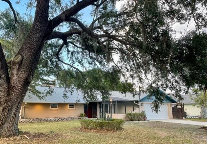 Welcome to Bent Tree Village! This very popular, sought after Community with mature trees and lush, green foliage is a short distance East. of I-75 off Bee Ridge Road. The entrance to this peaceful Subdivision is South of Bee Ridge onto Bent Tree Blvd. and has a Low Annual Fee of $300 and NO CDD'S! Wow! This 3 Bedroom and 3 Full Baths Split Plan Home with 2,180 sq. ft. is situated on a large, partially fenced, corner lot and has a sprinkler system with a 30' well for irrigation! (Saves $$ on water bill). Your Future Home is ready for you to update, as you wish! Just bring your imagination, a color palette and your bathing suit! The possibilities are endless! There are 17 Impact Windows throughout the Home! There are 4 sets of French Doors with installable, protective, hurricane covers, (stored in the garage) and 3 of the sets give direct access to the sparkling, 45'X13', caged pool for your Enjoyment on one of our many, hot Summer days! A New Shingle Roof and 3 skylights were installed in January, 2023 as well as the Electrical Panel! The kitchen was updated in 2022 with new Cabinets and solid surface countertops, including the 8+' Breakfast Bar between the Kitchen and Family room. The newly installed skylight in the Family Room Brightens up even cloudy, rainy days! Let's not forget the large Living Room with Vaulted Ceiling, 2 skylights and a Fabulous Stone Fireplace with Marble Hearth over looking the awesome and inviting pool! Not too far from there we find the 12'X15' Dining Room with French Doors overlooking a low-walled and cleared out screened area perfect to be finished off and used as a patio or keep it open as a home for your favorite flowers and plants! The Large (13X17) Primary Bedroom with a (6X10) walk in closet and en suite Bathroom exits to pool also! This House has an abundance of Storage! Each of the 3 Baths have a Linen Closet and there's a Pantry in the Kitchen and Laundry Room! The Garage has 3 Work Benches! All Popcorn Ceilings were removed in 2020 and replaced with a painted, smooth ceiling! Call for a Showing today!!