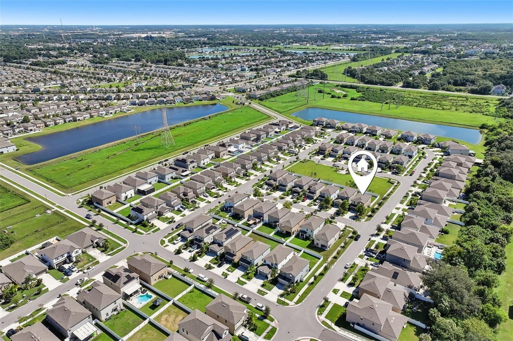 Photo of 4714 Ron Eddie Place, Tampa, FL 33619 (MLS # TB8548124)