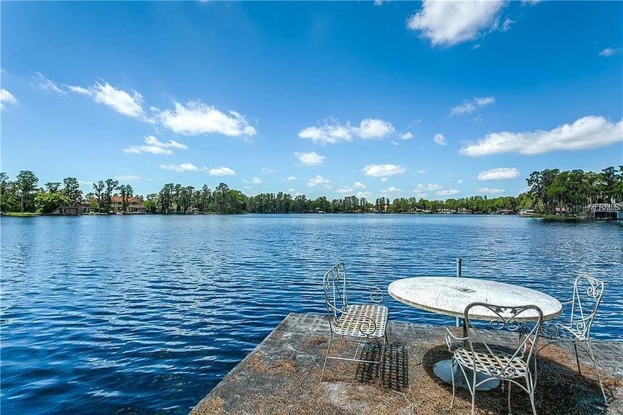 LOCATION,LOCATION,LOCATION Private Gated waterfront home with endless possibilities! Direct Lake Keystone access, one of Hillsborough County's Largest Lakes! This home Is very versatile -whether for a single family or Family with In Law Suite. Bring your Boats,Jet ski's,Fishing Poles etc---even room for RV storage. Enter into the Large Great room with direct views to the Lake. Large Formal Dining Area and enormous Kitchen! Plenty of sliders welcoming the outdoors in ,covered and screened patios/ The Main Home has 4 bedrooms. Large Master suite cover the whole upper back of home with 2 Balconies. Large Walk in closets and Large Master Bath. Large 2nd Master suite located on the First floor-tucked away for privacy yet also has a Lake View. At the Front of the home is a Very Large Apartment with Full Bath and Bedroom. Plua 3 Car Garage !Enjoy Beautiful Sunsets !!