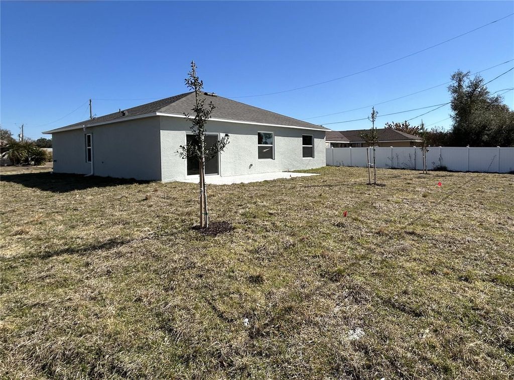 Photo of 175 Fletcher Street, Port Charlotte, FL 33954 (MLS # O6285361)