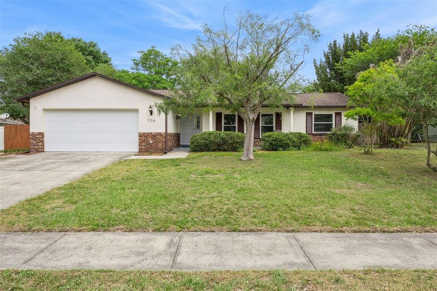 This home is ready for its new owners! Set on over a quarter-acre lot, this property offers a spacious, fully fenced backyard with mature trees providing shade and privacy, perfect for outdoor enjoyment. The screened lanai creates a comfortable space to relax or entertain year-round, while the extended oversized 2-car garage offers plenty of room for parking and storage. Located in a community with access to Starke Lake, you’ll enjoy beautiful surroundings and convenient lake access just moments away. The wood fence was installed in 2022, adding both function and curb appeal.

Inside, the home features all newer double-pane windows, allowing for energy efficiency and natural light throughout, along with ceiling fans in multiple rooms for added comfort. The guest bathrooms have been renovated, offering updated finishes and a clean feel. Major system updates have already been taken care of, including a water heater installed in 2013, the roof was replaced in 2018, A/C updated in 2019, and a full re-plumb with PEX piping completed in 2020. Schedule your showing today!