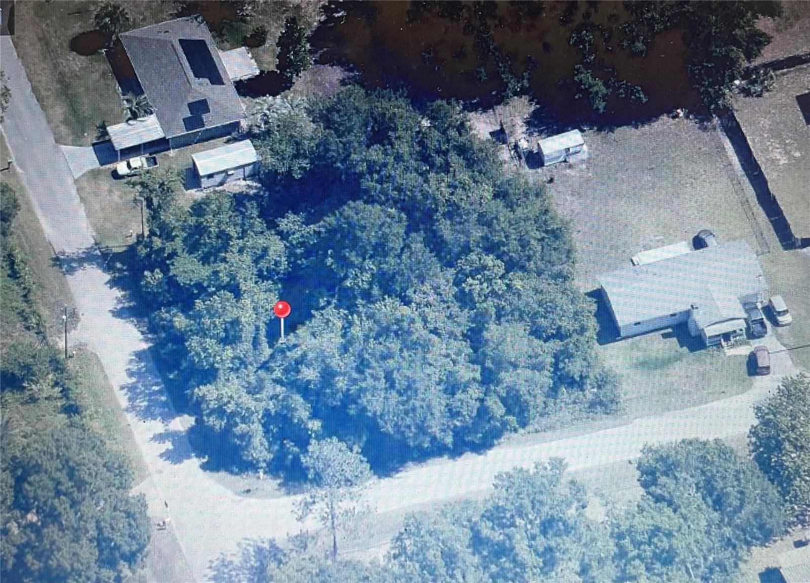 Located in Belleview Heights Estates this corner lot on a paved county road.