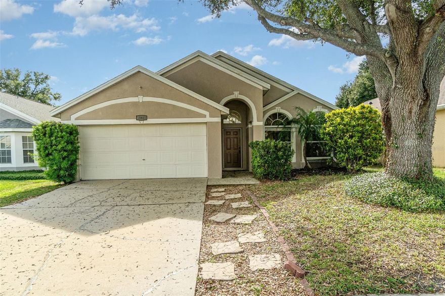 One or more photo(s) has been virtually staged. Welcome to this charming Clermont home with fantastic curb appeal and a layout designed for comfort and convenience. Step inside to find a spacious living room that flows seamlessly into the family room, offering an open view into the kitchen. The kitchen is equipped with modern stainless steel appliances and plenty of cabinet space, perfect for everyday living and entertaining. Tile and LVP flooring run throughout the home, adding durability and style. Outside, enjoy the privacy of the enclosed backyard; ideal for relaxing, hosting gatherings, or enjoying the Florida sunshine. This move-in ready home blends comfort, function, and location, making it a must-see opportunity.