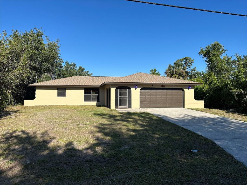Photo of 1022 Waterside Street, Port Charlotte, FL 33952 (MLS # C7507748)