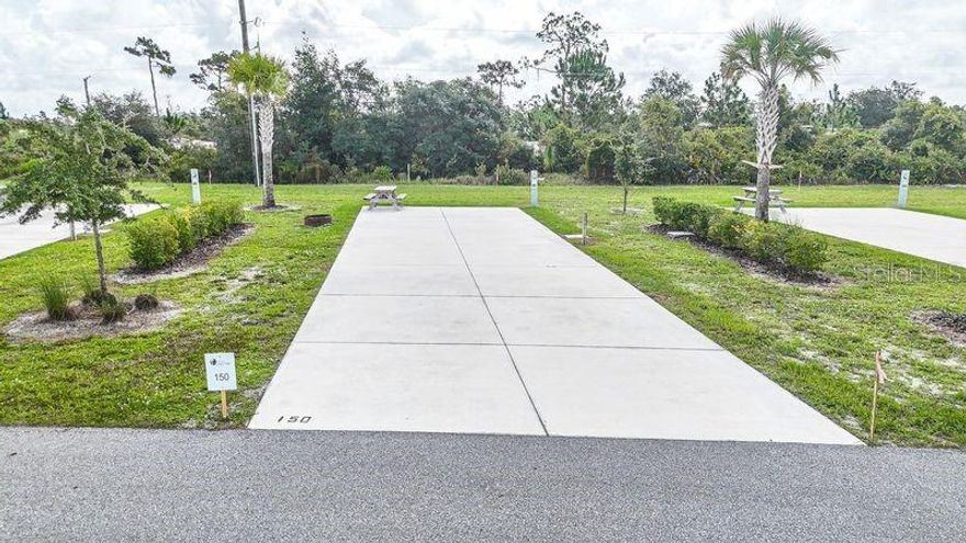 Discover a rare opportunity to own in Resort at Canopy Oaks — one of Central Florida’s premier luxury RV resorts. This deeded 45’ x 90’ RV Lot 150 offers privacy, flexibility, and income potential in one exceptional package.

Ideally positioned at the rear of the resort and backing to a nature preserve, this lot delivers ultimate privacy with direct access to scenic walking trails. The spacious 20’ x 70’ concrete pad with full 20/30/50 amp hookups easily accommodates Class A and Class C motorhomes, fifth wheels, travel trailers, or a small park model — ready for immediate enjoyment and customization to your preferences.

Ownership includes access to 435 acres of gated resort luxury, featuring a tropical tiki bar with live music, resort-style pool and hot tub, pickleball courts, fitness center, full-service spa, and on-site dining. Enjoy it as your personal retreat or participate in the professionally managed rental program to generate income while you’re away.

Preserve-backed RV lots with this level of privacy and amenity access are limited. With developer incentives currently available, now is the time to secure your place in this highly sought-after community. Schedule your private tour today before this opportunity is gone.