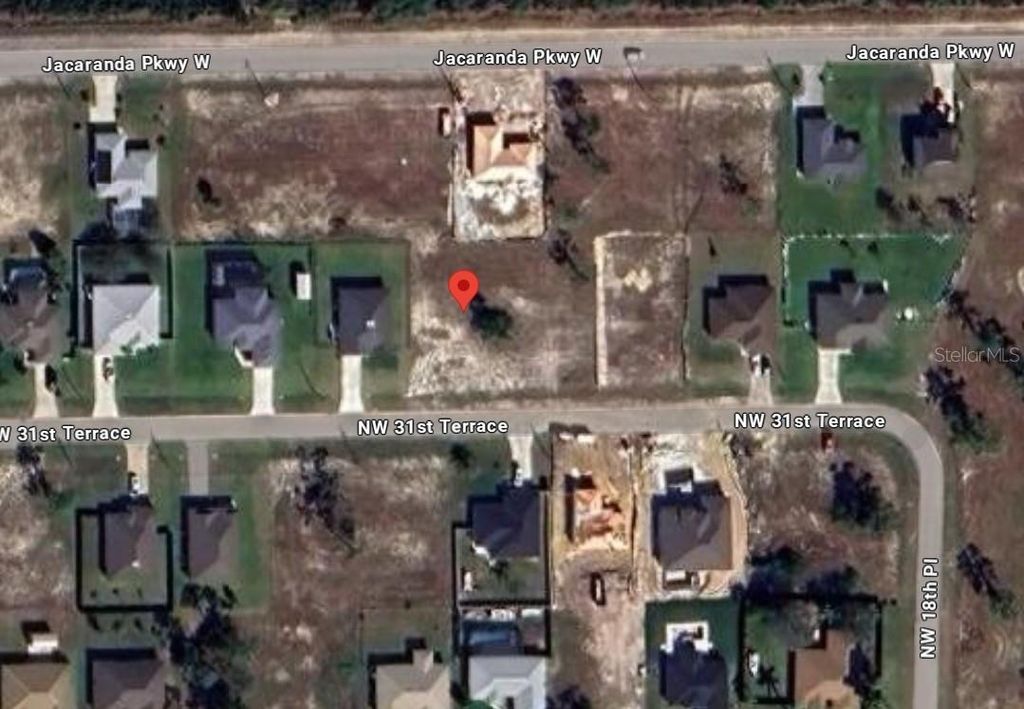 Photo of 1909 NW 31st Terrace, Cape Coral, FL 33993 (MLS # C7514420)