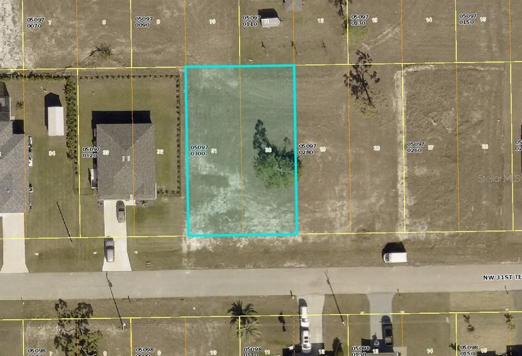 Photo of 1909 NW 31st Terrace, Cape Coral, FL 33993 (MLS # C7514420)