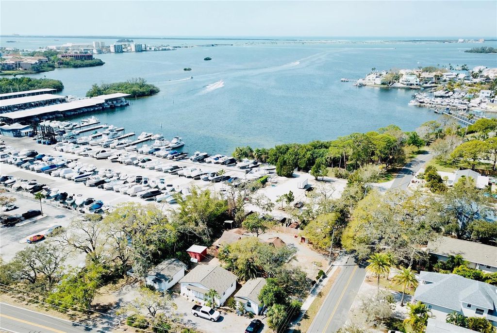 Photo of 15 Shore Drive, Palm Harbor, FL 34683 (MLS # TB8404835)