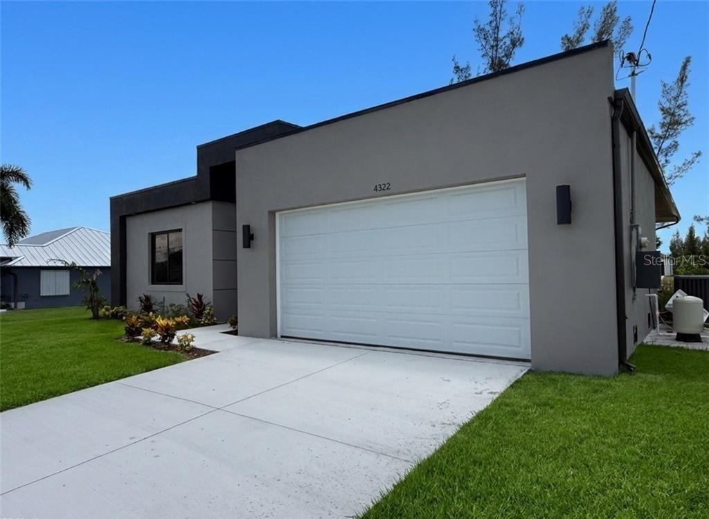 Photo of 4322 Kismet Parkway W, Cape Coral, FL 33993 (MLS # O6437866)