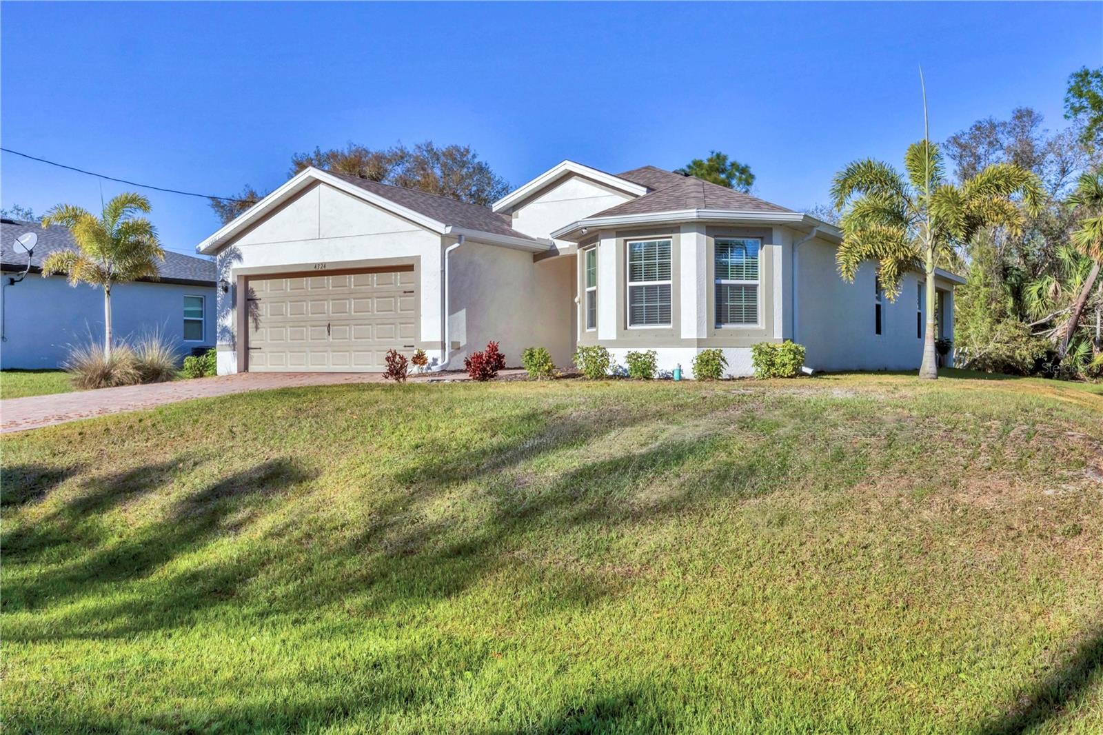 Your dream home just got more affordable! Now listed at ONLY $334,000 for 1748sq.f, PLUS $10,000 credit to the buyer with acceptable offer—use it for closing costs, upgrades, or to buy down your interest rate! Skip the wait and step into this gorgeous, move-in-ready 2023-built home in North Port! This 3-bedroom, 2-bathroom gem offers the perfect blend of modern design, comfort, and convenience. There are Spacious Living with open-concept layout and abundant natural light, Master suite featuring dual sinks, spacious walk-in closet and a shower room, Chef’s Kitchen with Elegant 36-inch cabinetry and quartz countertops, Ample storage and a pantry for all your culinary needs, Stunning paver driveway with ample parking, Private covered lanai and spacious backyard with endless possibilities. Currently tenant-occupied, offering instant rental income for savvy investors or homeowner, who is not quite ready to move in! With easy access to US41 and I75, as well as schools, grocery stores, retail shopping, and dining options, everything is conveniently nearby. If you're a sports fan, you'll love being close to Wellen Park and the Atlanta Braves Spring Training facility. And for those who love the beach and outdoor activities, the beautiful Gulf beaches, boating opportunities, and world-class fishing spots are just a short drive away. Additionally, Warm Mineral Springs, known for its rejuvenating waters, is only minutes from your doorstep. No HOA, no CDD. Thriving area with new construction, Great Investment Opportunity! This is your chance to own a slice of Florida paradise in a growing community. Don't wait—make your offer today before it's gone!