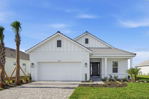 Photo of 13713 Iona Avenue, Palmetto, FL 34221 (MLS # TB8425450)