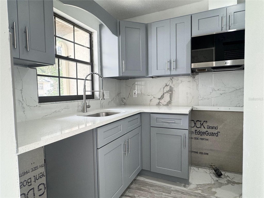 Photo of 2207 Karl Street #A, Leesburg, FL 34748 (MLS # O6430846)