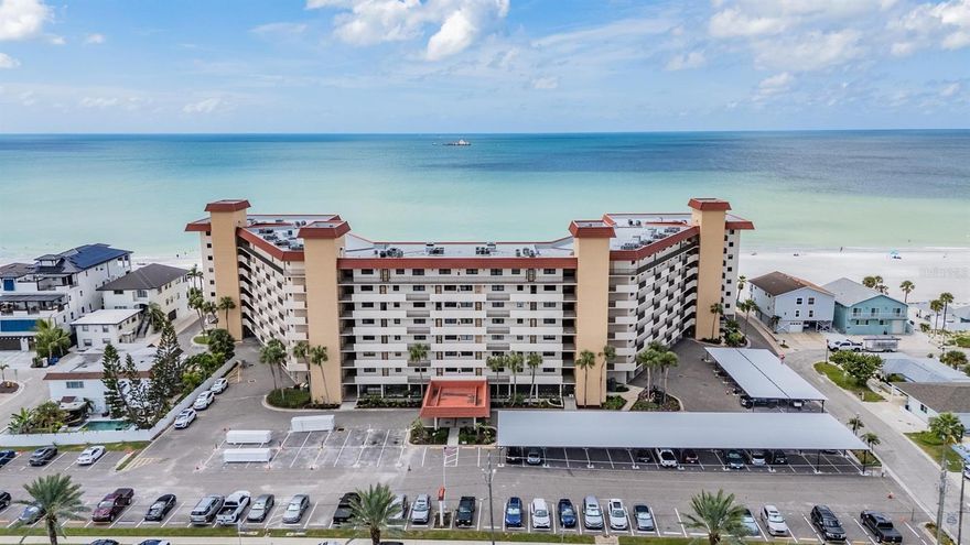 Welcome to Shore Mariner, a 55+ community located in Redington Shores. This Two Bedroom FURNISHED condo is all you could want- step inside and be delighted with the OPEN FLOOR PLAN and spacious rooms. The kitchen has wood cabinets, GRANITE COUTERS, stainless appliances, and is WELL-EQUIPPED with kitchen utensils.  The Kitchen flows smoothly into the Dining/Living areas that are BEAUTIFULLY FURNISHED and filled with natural light. Sliding doors in the living area afford a VIEW OF THE BEACH AND GULF and take you to a private screened balcony where you can enjoy the fresh air, gulf breeze and spectacular sunsets. The Primary Bedroom offers the same STUNNING VIEWS, has a walk in closet and EN SUITE BATH with a tub/shower combo.  The guest room is oh so private with 2 FULL BEDS, and en suite bath with walk in shower and large closet.  The IMPACT RATED SLIDERS and bedroom window give you a sense of security on stormy days.  The OUTDOOR CENTER COURTYARD IS BEAUTIFUL  - Heated Pool, SPA, and expansive new pool deck.  All refurbished shuffleboard and grilling patios.  The community is currently restoring the gathering room, workout room, and library.  A reserved parking space, ample guest parking, and SECURED BUILDING ENTRY are additional features you will appreciate.  Unit is available on an annual basis beginning in December, 2025 at $3000 month or a four month seasonal lease at $3500 month, sorry, NO PETS OR SMOKING please.  Start living the beach life now