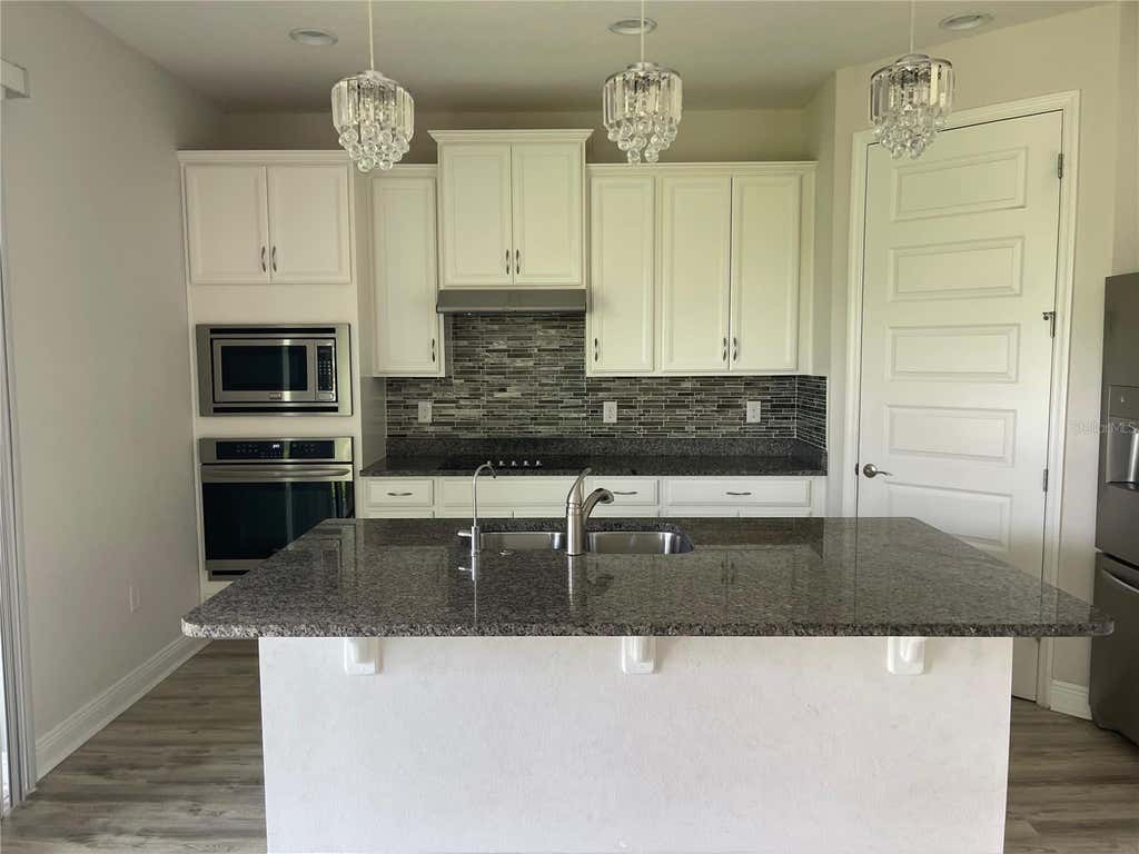Photo of 10194 Atwater Bay Drive, Winter Garden, FL 34787 (MLS # O6413400)