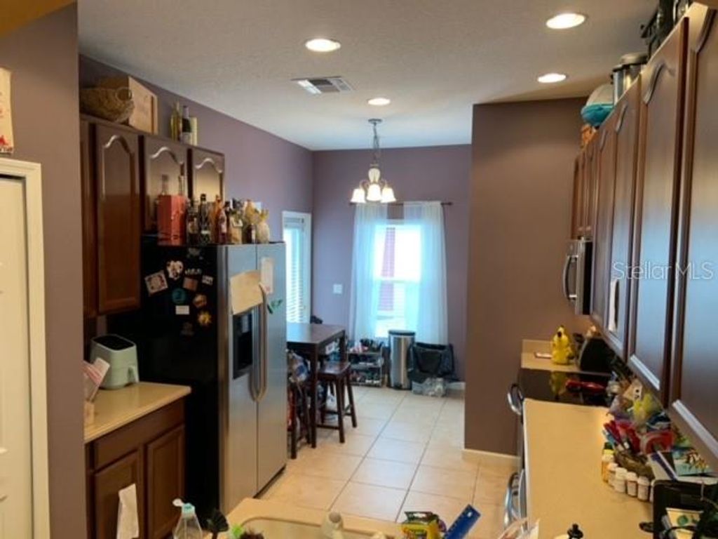 Photo of 9118 Sabal Pine Way, Orlando, FL 32832 (MLS # O6413027)