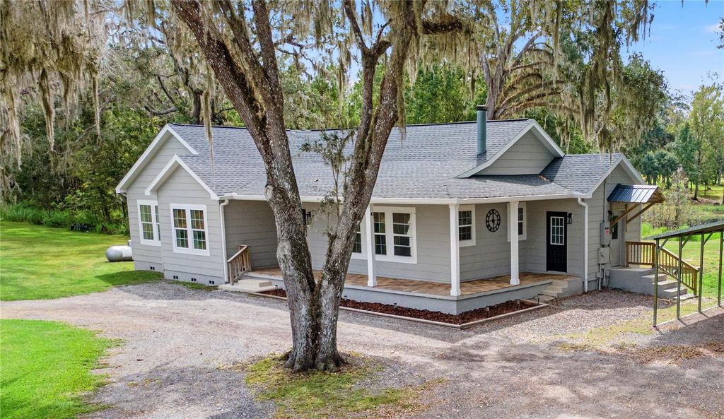 Photo of 1097 Bennett Lane, Brooksville, FL 34604 (MLS # W7879541)