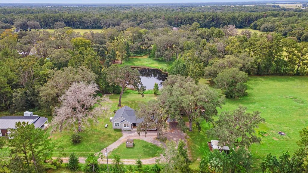 Photo of 1097 Bennett Lane, Brooksville, FL 34604 (MLS # W7879541)