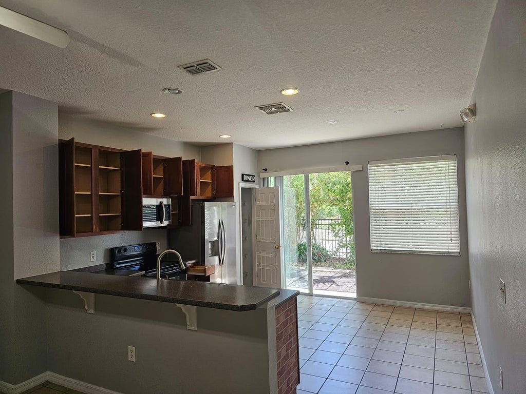 Photo of 5116 Dominica Drive, Kissimmee, FL 34746 (MLS # S5152018)