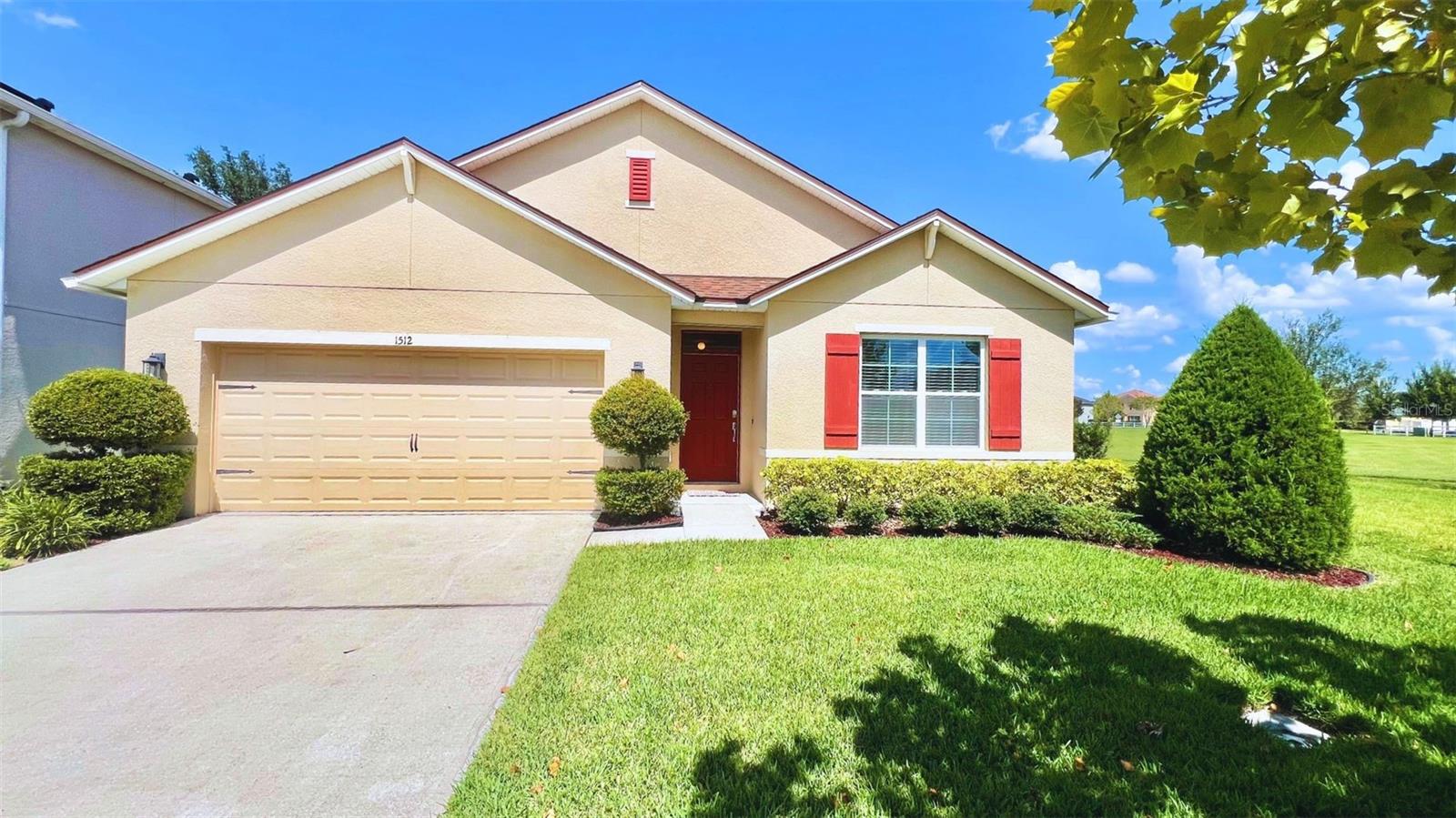 Available NOW! $0 Application Fee for Pre-Approved Applicants! This beautifully maintained 4-bedroom, 2-bathroom home offers comfort, space, and functionality in every corner. The bright open layout features neutral tile flooring, an elegant arched entryway, and a spacious kitchen equipped with granite-style countertops, sleek cabinetry, and stainless steel appliances—perfect for everyday cooking and entertaining. All four bedrooms are generously sized, offering ample closet space and flexibility for family, guests, or a home office. The primary suite includes a large walk-in closet, and the laundry room is equipped with a full-size washer and dryer and overhead storage cabinets for added convenience. Step outside to a screened-in patio with peaceful green space views, ideal for enjoying your morning coffee or evening breeze. Additional perks include a 2-car garage with a utility sink and attic access. Located in the desirable Kindred community, residents enjoy access to resort-style amenities including a pool, fitness center, clubhouse, tennis and pickleball courts, volleyball, dog park, playgrounds, and miles of scenic trails—all just minutes from the Florida Turnpike, top-rated schools, and shopping. Additional lawn maintenance fee applies. Schedule your tour today!
