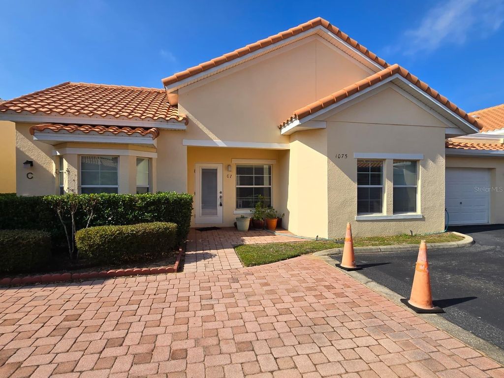 Photo of 1075 David Walker Drive #C-1, Tavares, FL 32778 (MLS # O6364053)