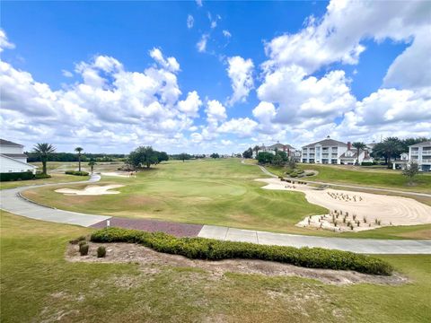 Photo of 7673 Heritage Crossing Way #202, Reunion, FL 34747 (MLS # TB8380424)