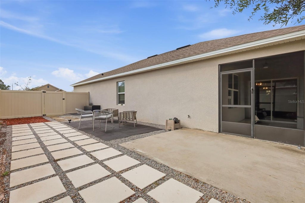 Photo of 704 Red Hawk Lane, Deltona, FL 32725 (MLS # O6453470)