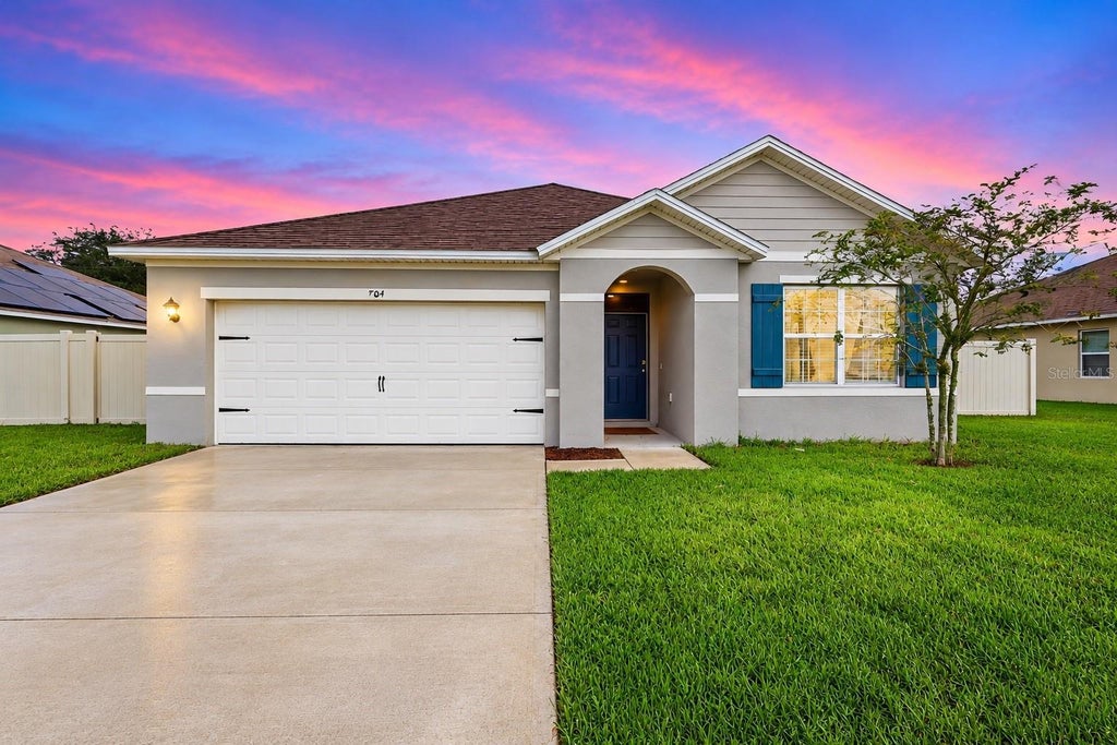 Photo of 704 Red Hawk Lane, Deltona, FL 32725 (MLS # O6453470)