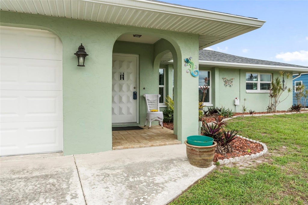 Photo of 140 Barre Drive NW, Port Charlotte, FL 33952 (MLS # C7525902)
