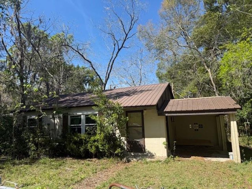 This 1948-built, 926-square-foot, 3-bedroom, 1-bath home is ready for someone with vision.  This property is a fixer-upper with great potential.  Whether you're an investor, renovator, or buyer looking to create a home of your own, this property offers great potential.   The AC is 2025, and the metal roof is 15 years old.  This area is near the University of Florida, Santa Fe College, and downtown.  Property being sold as-is.