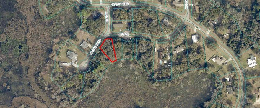 LOCATED IN LOVELY SILVER SPRINGS WOODS. WONDERFUL LOT ON A PAVED STREET, HIGH AND DRY WHERE THE HOME WILL GO. ON NORTH LAKE BRYANT. AWAY FROM CITY AND MIXED USE. MOBILES OR SITE BUILT HOMES OK.