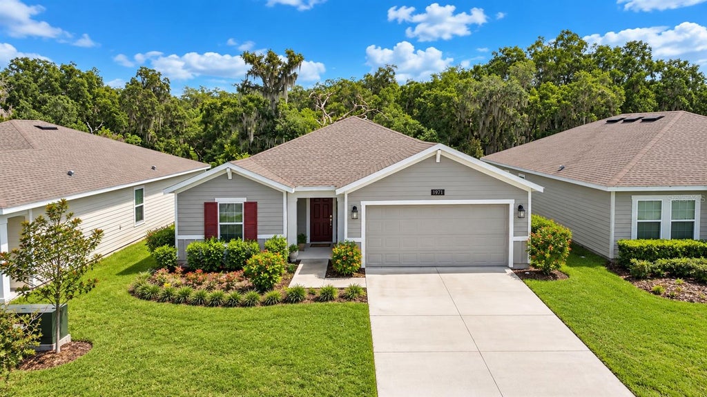 Photo of 1971 Cricket Cradle Drive, Kissimmee, FL 34746 (MLS # O6440525)