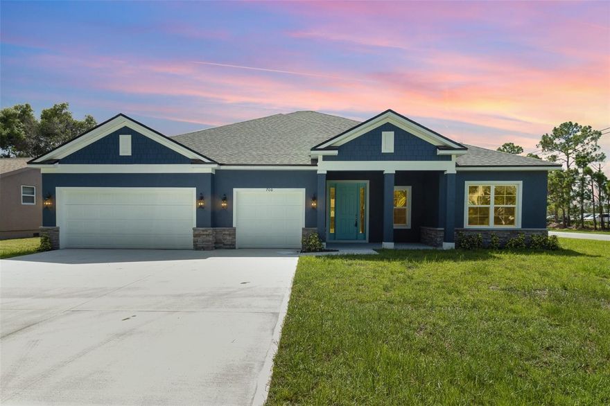 High end luxury meets affordability in this stunning 4-bedroom 3-bathroom 3 car garage home situated on a central lot close to all things Ocala! Stand out features include Sparking White Quartz countertops, designer tile selections in all the bathrooms, Samsung stainless steel appliances plus washer and dryer, 9'4'' ceiling & 8' doors throughout the entire home, Mohawk Revwood Plus flooring throughout (NO CARPET), and so much more. From the moment you arrive you will notice the oversized driveway with ample parking and tasteful stacked stone accents. Once inside, you will love the open floor plan with the living room, dining room and kitchen all flowing together in perfect harmony. The kitchen features 42'' upper cabinets, walk-in pantry, and an oversized island that is sure be the statement piece of this home. The Master suite is expansive with tray ceiling, dual sink vanity with beauty station, huge walk-in closet, and gorgeous shower. Guest bedrooms are all very well sized with 2 bedrooms sharing a jack and jill bathroom with dual sinks. Indoor utility room with tons of natural light will make laundry your favorite chore. The secluded covered lanai is perfect for grilling or just relaxing with family and friends. Properties like this don't come around very often, so schedule your private tour today before it's too late.