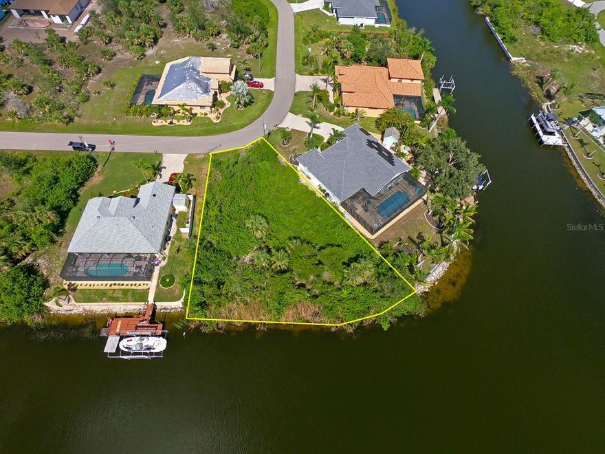 BEAUTIFUL TIP LOT with Gulf access lot located in South Gulf Cove is waiting for your new dream home to be built so you can relax on your dock or lanai to enjoy amazing Florida sunsets. Lot is sitting in a prime location with over 152.2 feet of canal water frontage... perfect for the avid boater having easy access within minutes to Charlotte Harbor. Easy quick boat ride to Cayo Costa, Boca Grande, Captiva, all the outer islands and the Gulf of Mexico providing some of the best fishing in all of SW Florida! Community offers a boat ramp, nice parks, close to several golf courses, world class fishing, restaurants and shopping. Only minutes to the pristine beaches of Boca Grande, Englewood and Manasota Key. Get this waterfront property while you can!!!