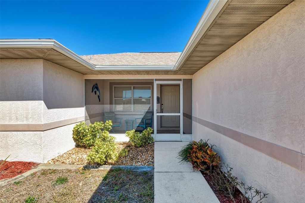 Photo of 13608 Clara Lane, Port Charlotte, FL 33981 (MLS # D6146700)