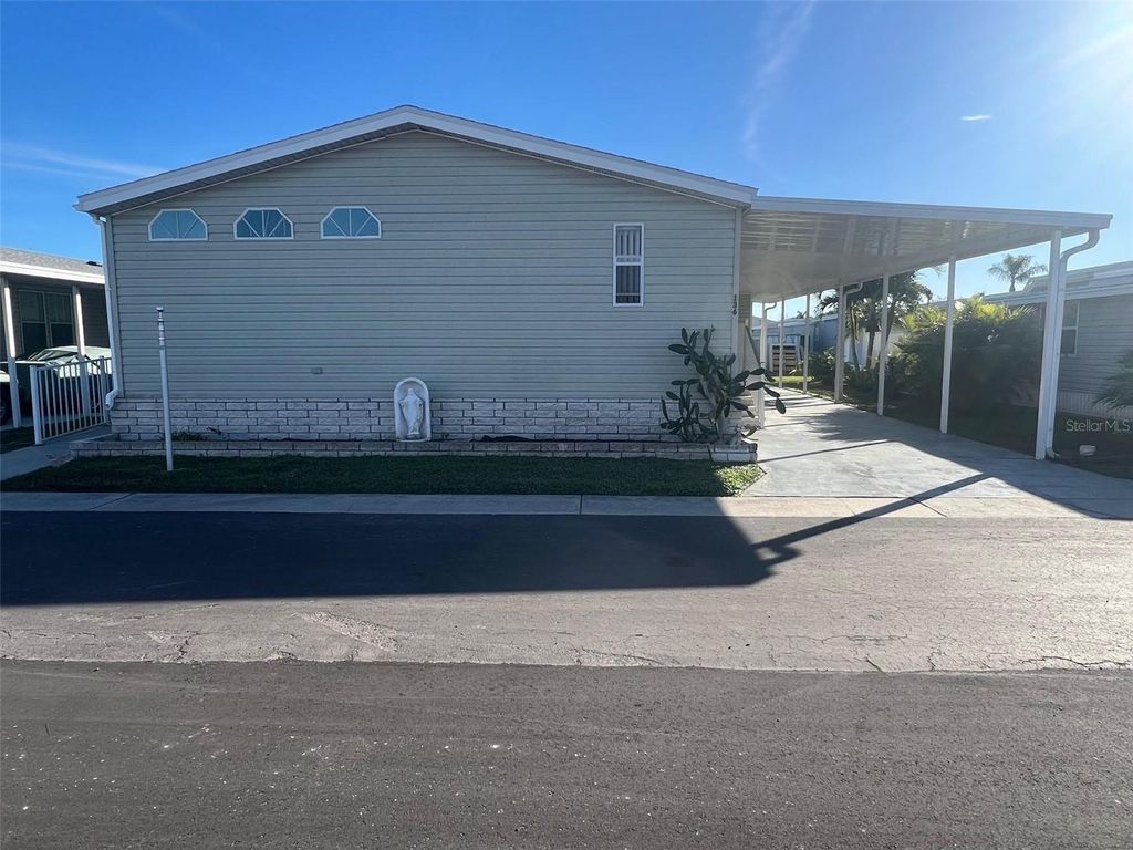 Photo of 11300 124th Avenue #136, Largo, FL 33778 (MLS # TB8466407)