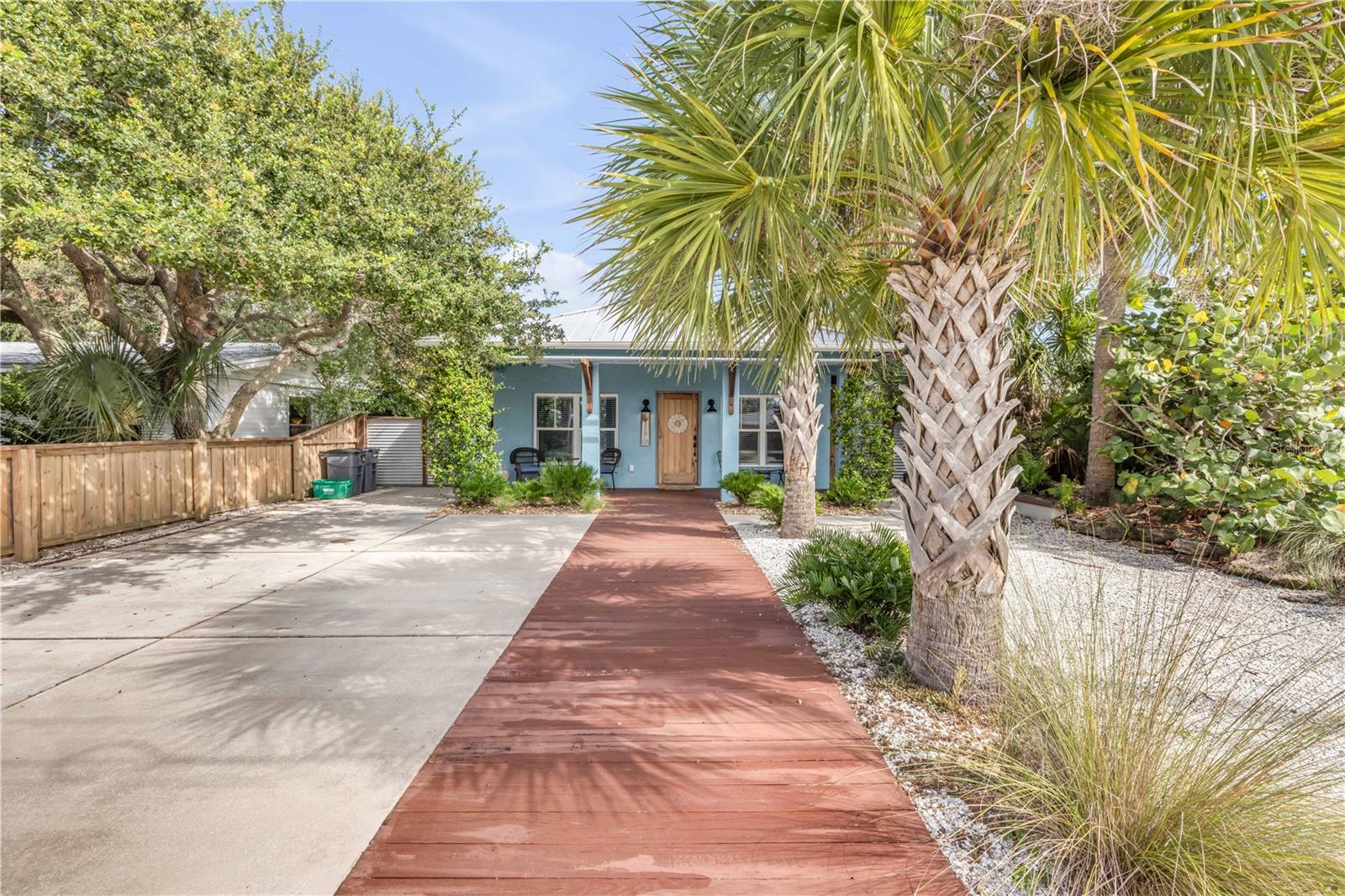 Beachside 3Br, 2Ba renovated designer home favorably located 1 ½ blocks to the beach and only a few blocks to Flagler Ave shops and restaurants. The Florida native landscaping is low maintenance, and eco-friendly. A custom Cypress doorway entrance opens to the grand room with 10’ ceilings, high impact windows and sliding barn doors. The open kitchen offers a farmhouse sink, wood cabinets and open shelving. There are solid surface countertops and custom light fixtures. The guest area is located right off the living room with a full bath between both bedrooms. Outdoor shower with both hot/cold water. Private yard with privacy fencing including beautiful native Sea Grapes. Block construction. Easy to view.